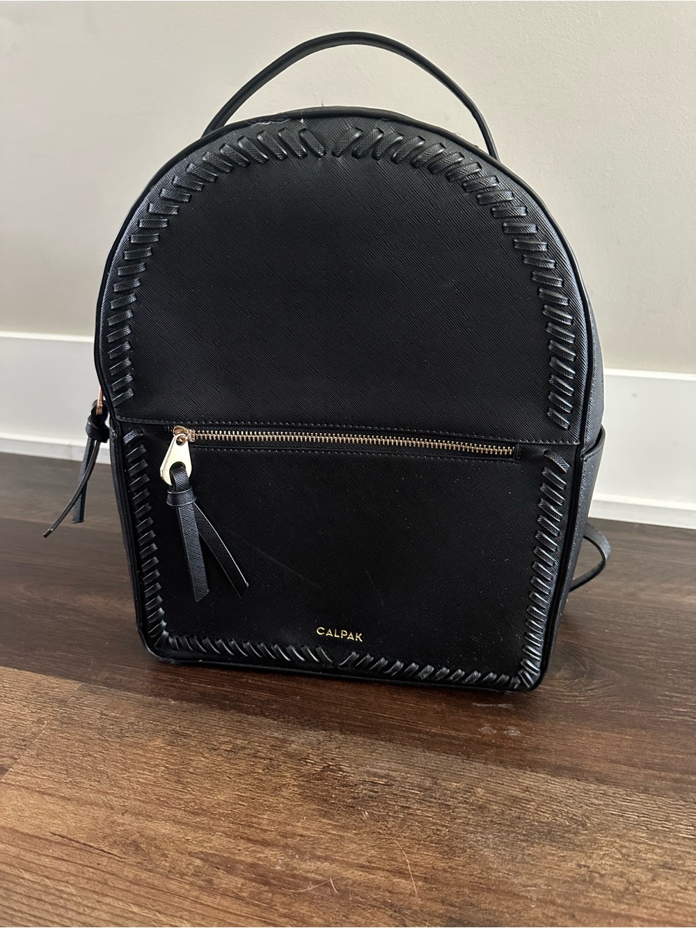 Calpak Black Whipstitch Mini Backpack with Gold-Tone Trim